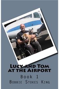 Lucy and Tom at the Airport