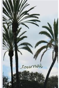 Three Palm Trees Against a Cloudy Sky Lined Journal Notebook