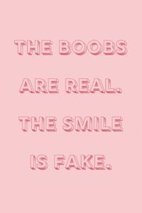 The boobs are real, the smile is fake
