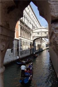 Gondola Ride Beneath a bridge in Venice, Italy Journal