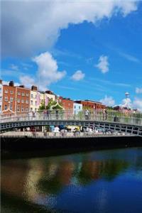 Ha'penny Bridge Over Liffey River in Dublin Ireland