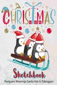 Penguins Wearings Santa Hat in Toboggan Sketchbook