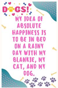 My idea of absolute happiness is to be in bed on a rainy day with my blankie, my cat, and my dog