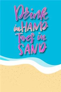 Drink in Hands Toes in Sand