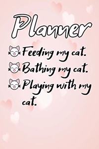 my funny planner with my cat on a pretty cute pink cover with hearts