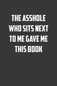 The asshole who sits next to me gave me this book