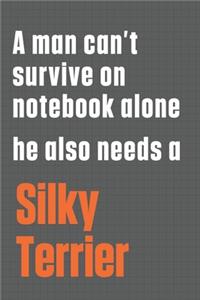 A man can't survive on notebook alone he also needs a Silky Terrier