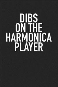 Dibs on the Harmonica Player