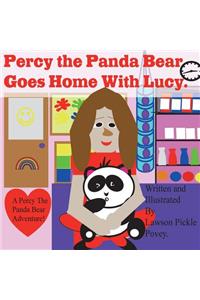 Percy the panda bear, goes home with Lucy.