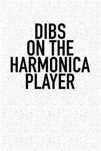 Dibs on the Harmonica Player