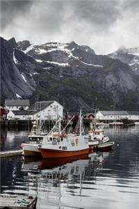 Boats in the Bay of Reine in Lofoten, Norway