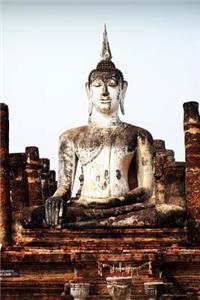 An Ancient Statue of Buddha in Thailand Journal