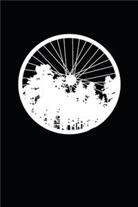 Bicycle Wheel With Forest Silhouette