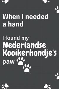When I needed a hand, I found my Nederlandse Kooikerhondje's paw