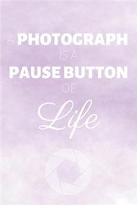 A Photograph Is A Pause Button Of Life