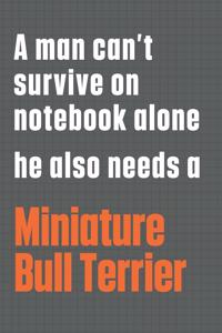 A man can't survive on notebook alone he also needs a Miniature Bull Terrier