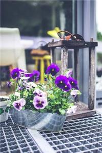 Tablescape with a Vintage Lantern and Pansies Journal