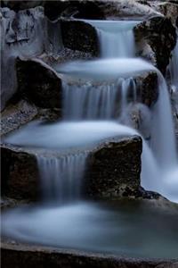 Waterfalls Cascade Down the Mountain Journal