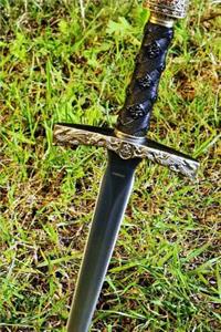 Ornate Dagger in the Grass Journal