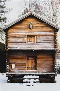 Tiny Snowy Cabin in the Woods