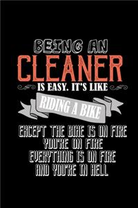 Being a cleaner is easy. It's like riding a bike. Except the bike is on fire, you're on fire, everything is on fire and you're in hell: Notebook - Journal - Diary - 110 Lined pages - 6 x 9 in - 15.24 x 22.86 cm - Doodle Book - Funny Great Gift