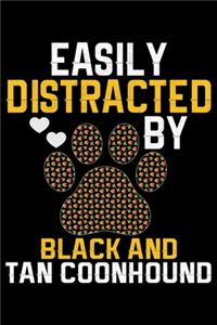 Easily Distracted by Black and Tan Coonhound