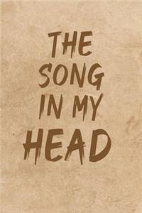 The Song in My Head Notebook on a background of sand