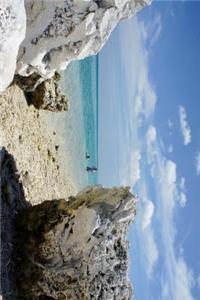 Sun Bleached Rocks and Blue Water on the Maldives Journal