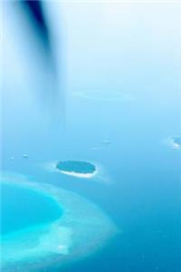 Aerial View of the Blue Waters of The Maldives Journal
