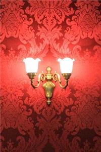 Red Wallpaper and a Retro Wall Sconce Journal
