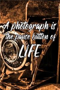 A photograph is the pause button of life