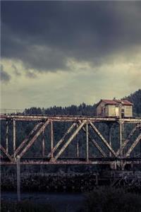 A View of an Old Bridge and a Cabin in the Mountains Journal