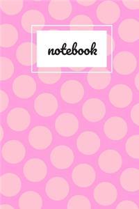 Pink polka dot print notebook