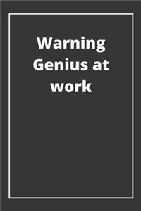 Warning Genius at work