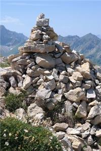 Massive Rock Cairn in the Alps Journal