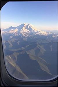 Looking Out an Airplane Window at a Snow Covered Mountain Travel Journal