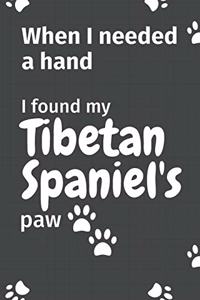 When I needed a hand, I found my Tibetan Spaniel's paw