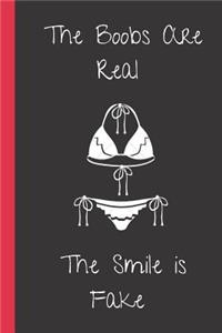 The Boobs Are Real. The Smile is Fake