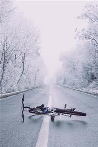 Bicycle Laid Down on a Road in Winter Journal
