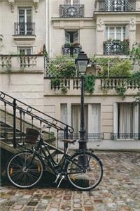 A Bicycle and a Beautiful Street in Paris France Journal