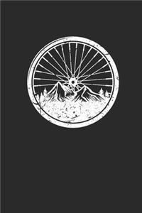 Bicycle Wheel With Mountain Silhouette
