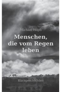 Menschen, die vom Regen leben