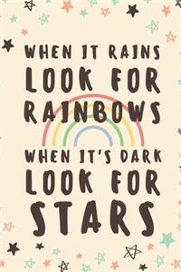 When It Rains Look For Rainbows When It's Dark Look For Stars