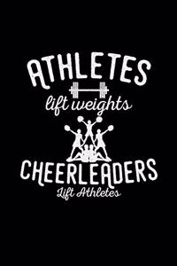 Athletes lift weights cheerleaders