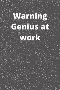 Warning Genius at work