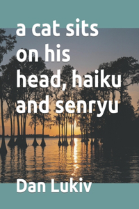 cat sits on his head, haiku and senryu