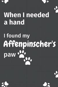 When I needed a hand, I found my Affenpinscher's paw