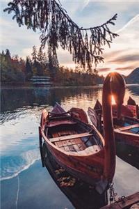 Whimsical Swan Boat on the Lake at Sunset Journal
