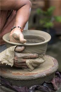 Pottery Vase on a Turning Wheel Journal: 150 Page Lined Notebook/Diary