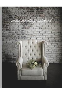 Armchair with Flowers Against a Brick Wall